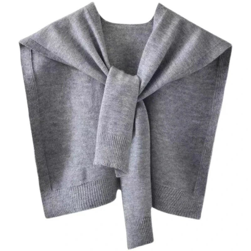 Women's knitted scarf wrap in cozy ribbed-hem finish, versatile layering piece with sweater-inspired texture