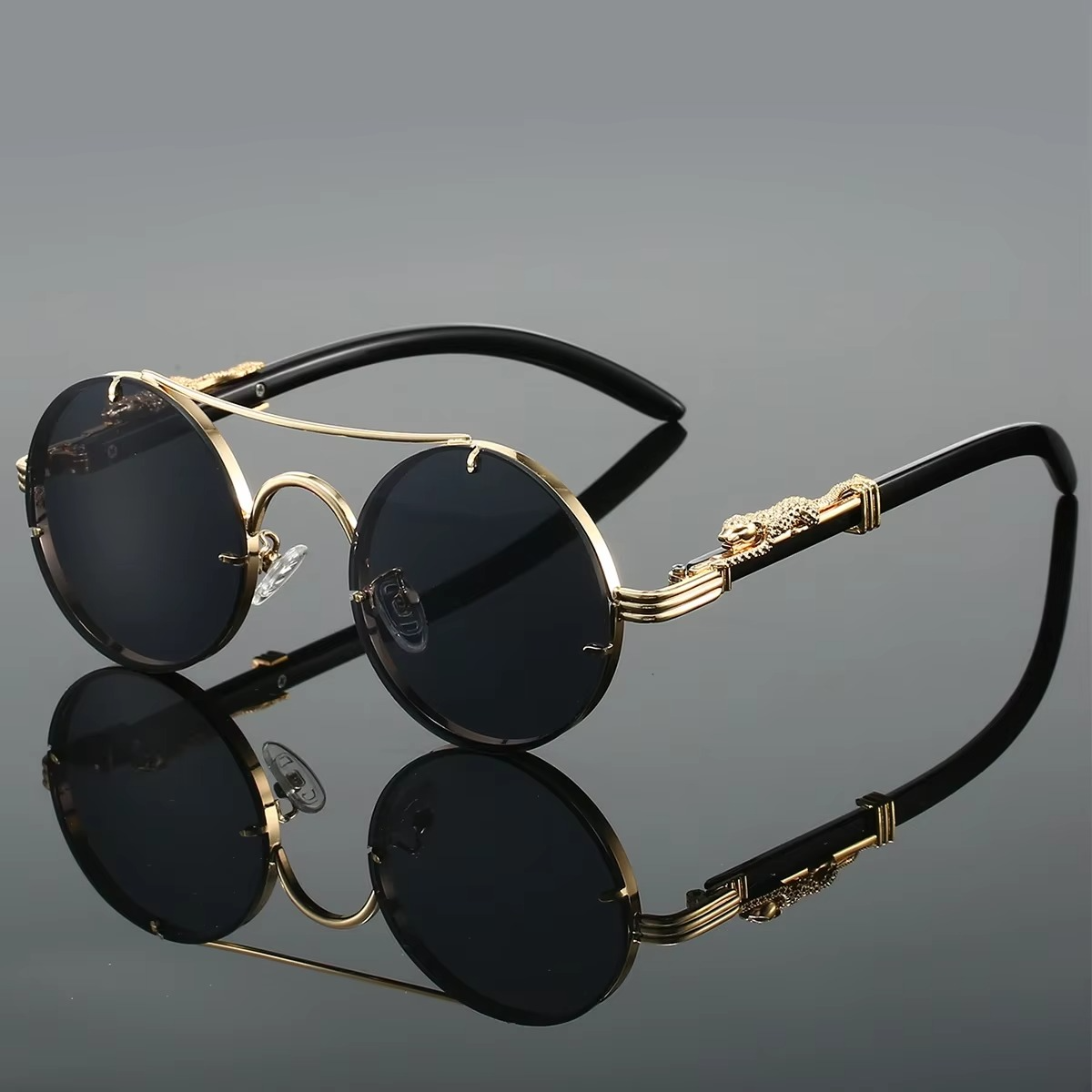 Vintage round unisex sunglasses gold-tone double bridge frame red tinted lenses featherweight