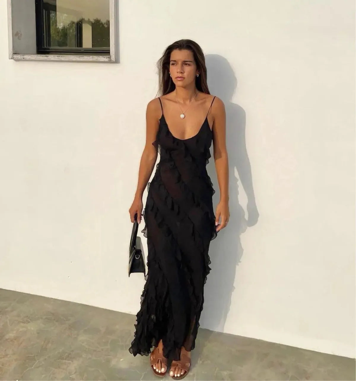 Flowy chiffon maxi dress with ladder ruffle details, open back, plunging V-neck in romantic evening style