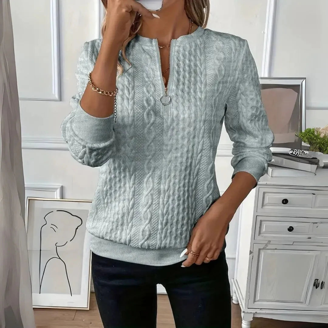 Women's cable knit quarter-zip pullover sweater, cozy textured layering essential for casual wear