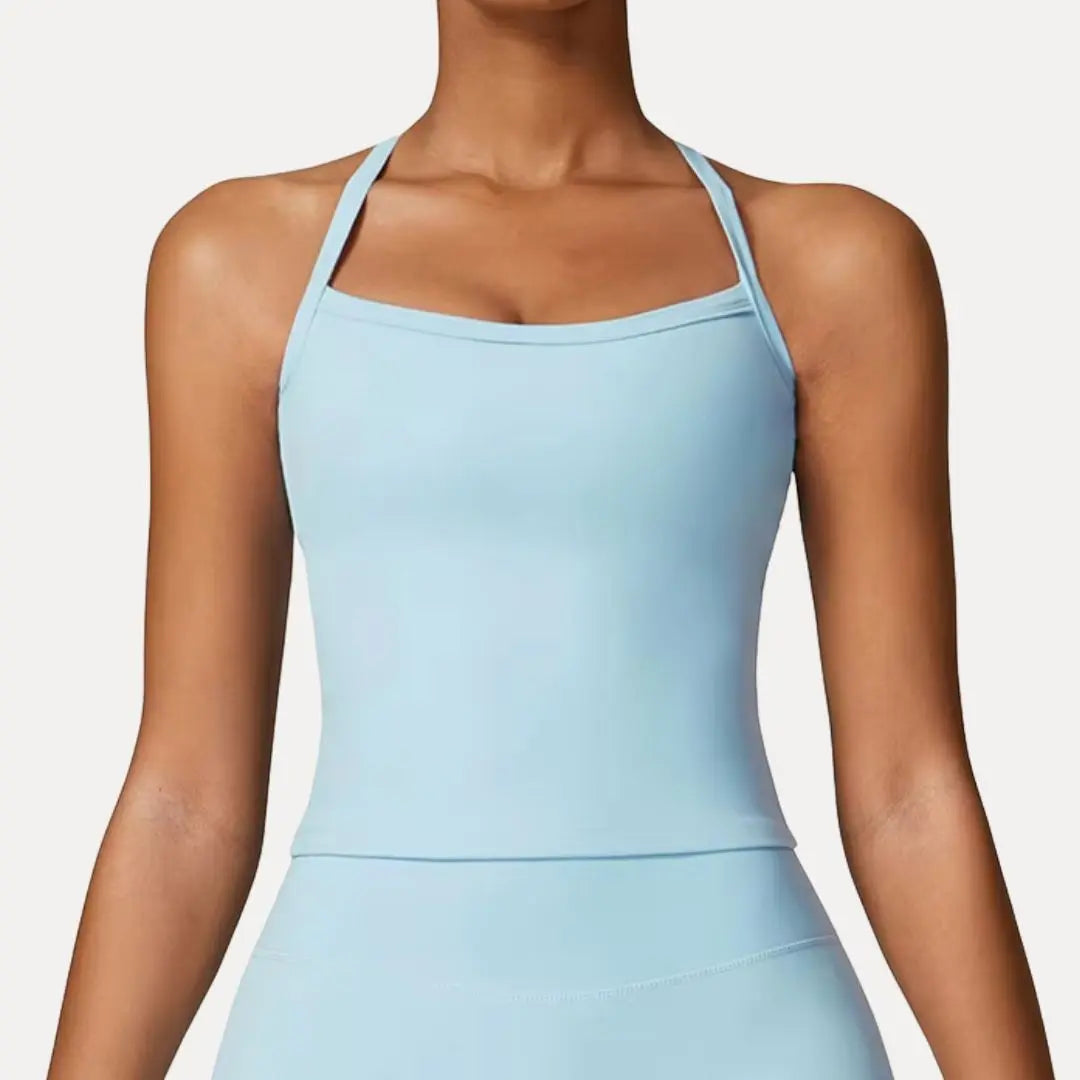 Women's black strappy back push-up yoga tank top with moisture-wicking breathable performance fabric