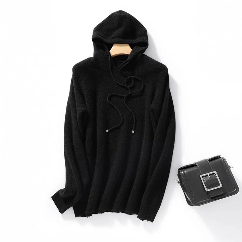 Women's relaxed ribbed hoodie in soft wool blend knit with clean hood and long drawstrings