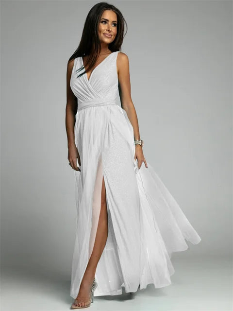 Elisa black satin evening gown with sheer mesh details, high slit, wrap cut silhouette