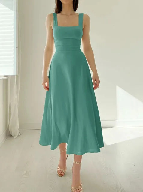 Women's elegant A-line dress with fitted waist, flattering neckline, timeless silhouette for versatile wear