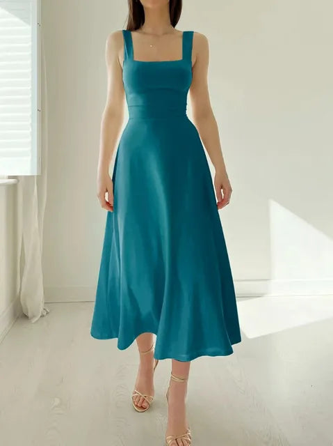 Women's elegant A-line dress with fitted waist, flattering neckline, timeless polished silhouette