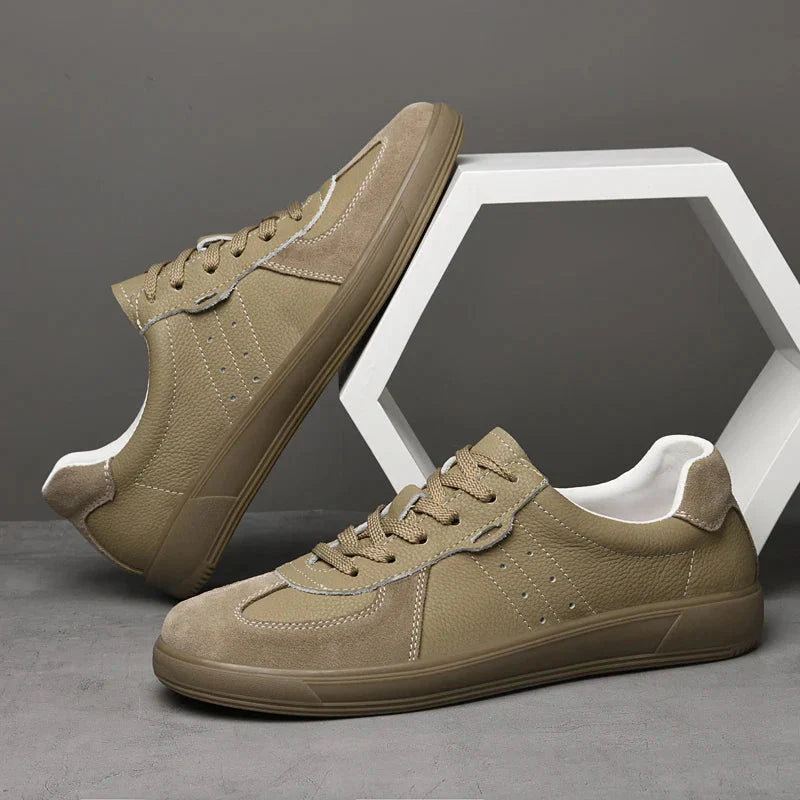 Men's low-top leather sneakers mixed material upper lace-up closure modern casual silhouette