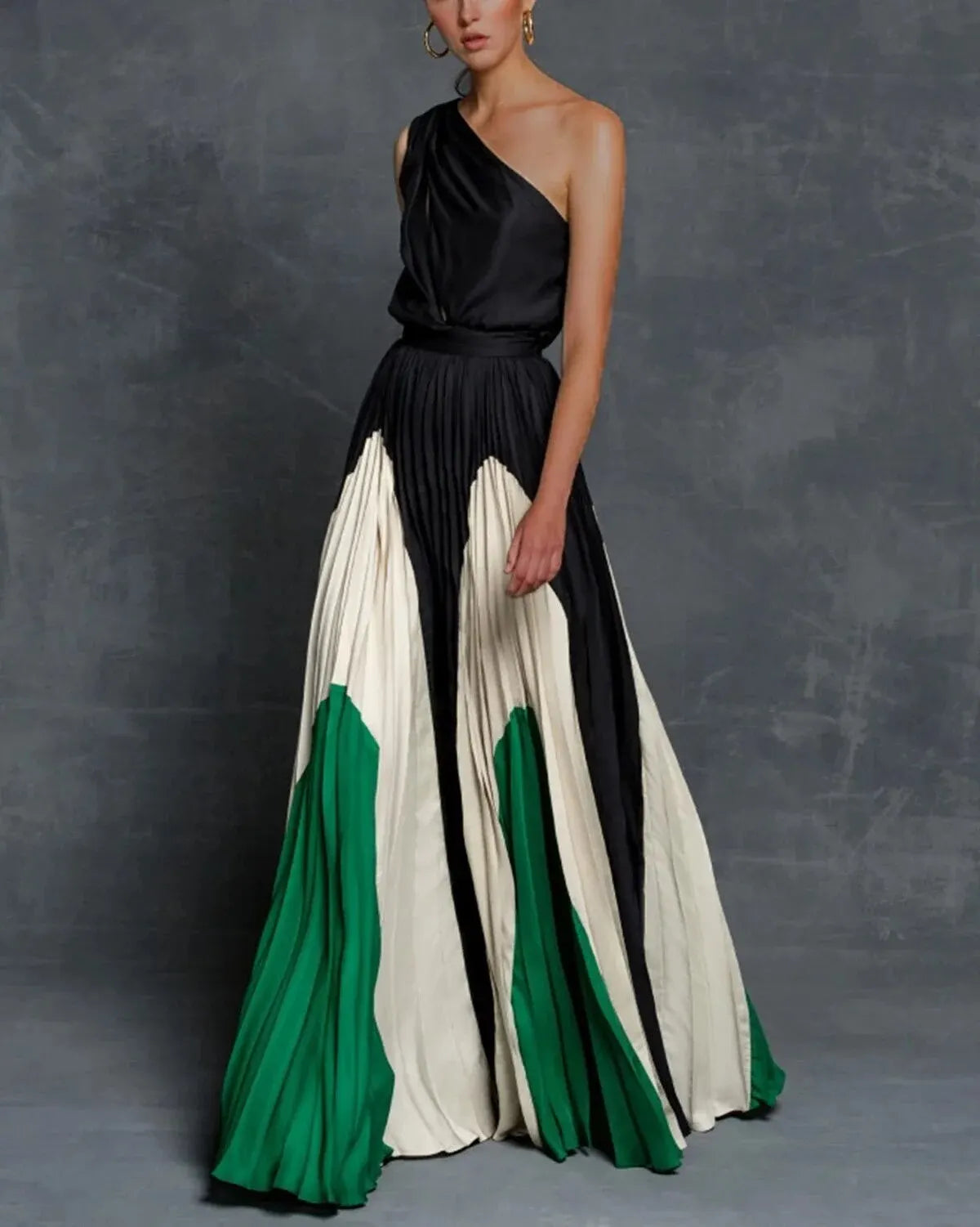 Elegant one-shoulder maxi dress with asymmetrical neckline, flowing silhouette perfect for special occasions