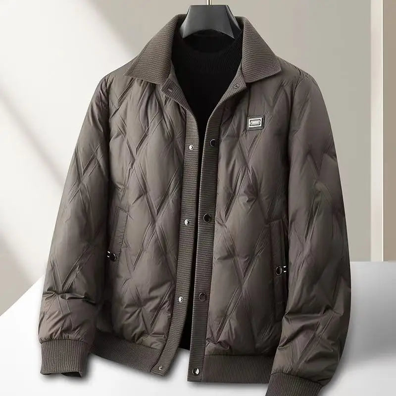 Men's black quilted bomber jacket with ribbed collar, hip-length cut and side pockets