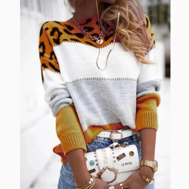 Women's cashmere turtleneck sweater color block design cozy winter warmth luxurious animal print