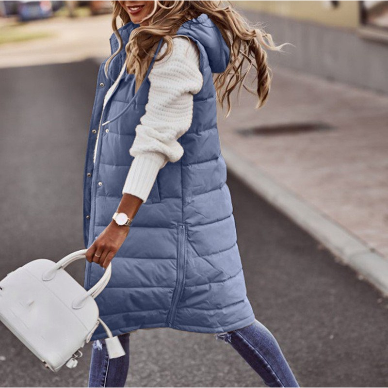 Women's long quilted down vest with hood, insulated winter outerwear for layering in cold weather