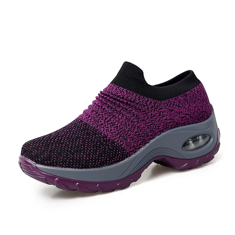 Women's black mesh platform sneakers with breathable knit upper and bold cushioned sole for gym