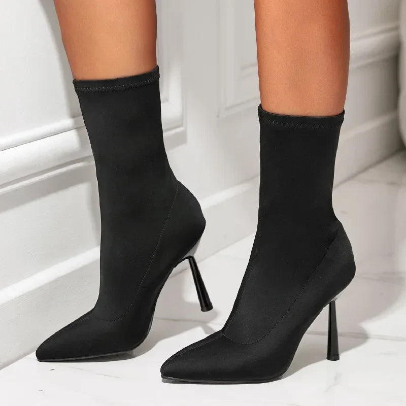 Black nylon stiletto boot with sleek sculpted profile and 8cm heel for bold evening looks