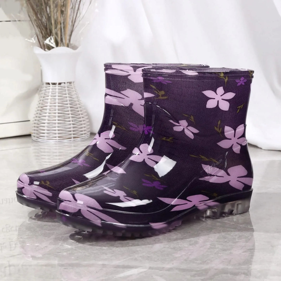 Women's black rubber Wellington boots waterproof slip-on mid-calf with outdoor traction sole
