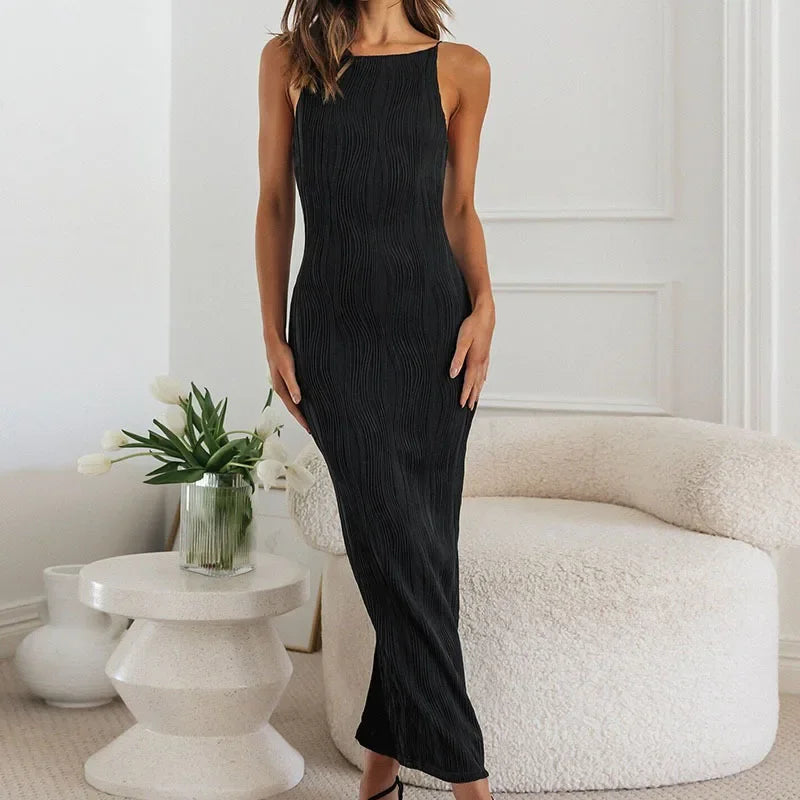 Maxi dress clean neckline elongating silhouette breathable textured fabric modern confident style