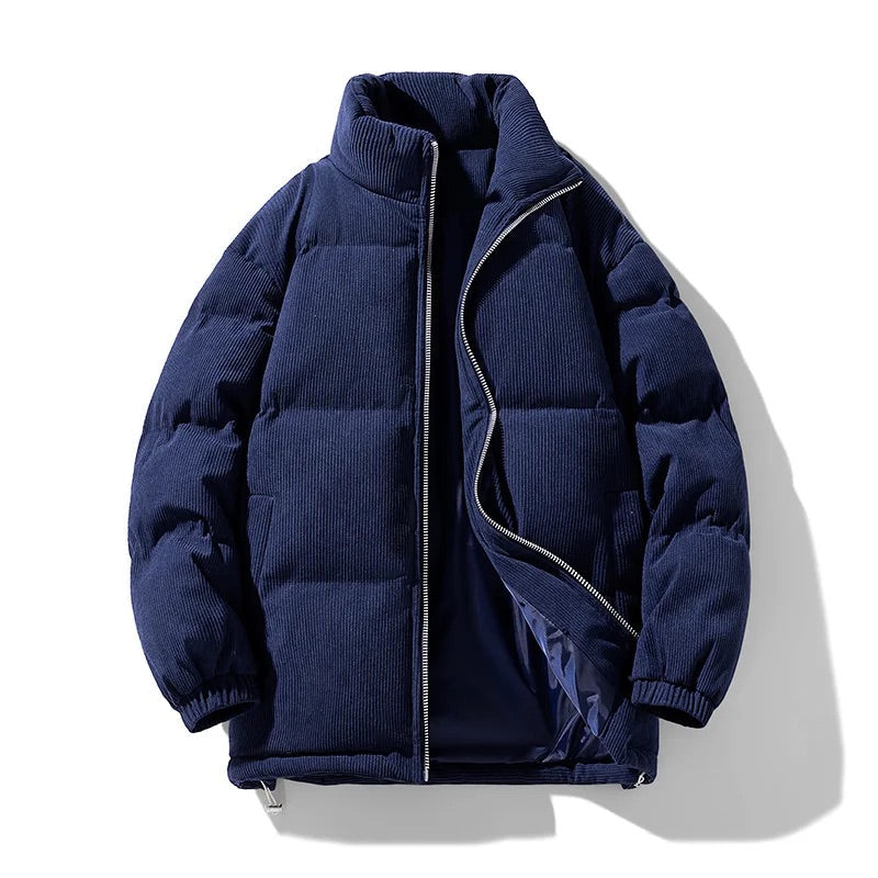 Men's oversized brown corduroy puffer jacket with quilted texture and relaxed casual silhouette
