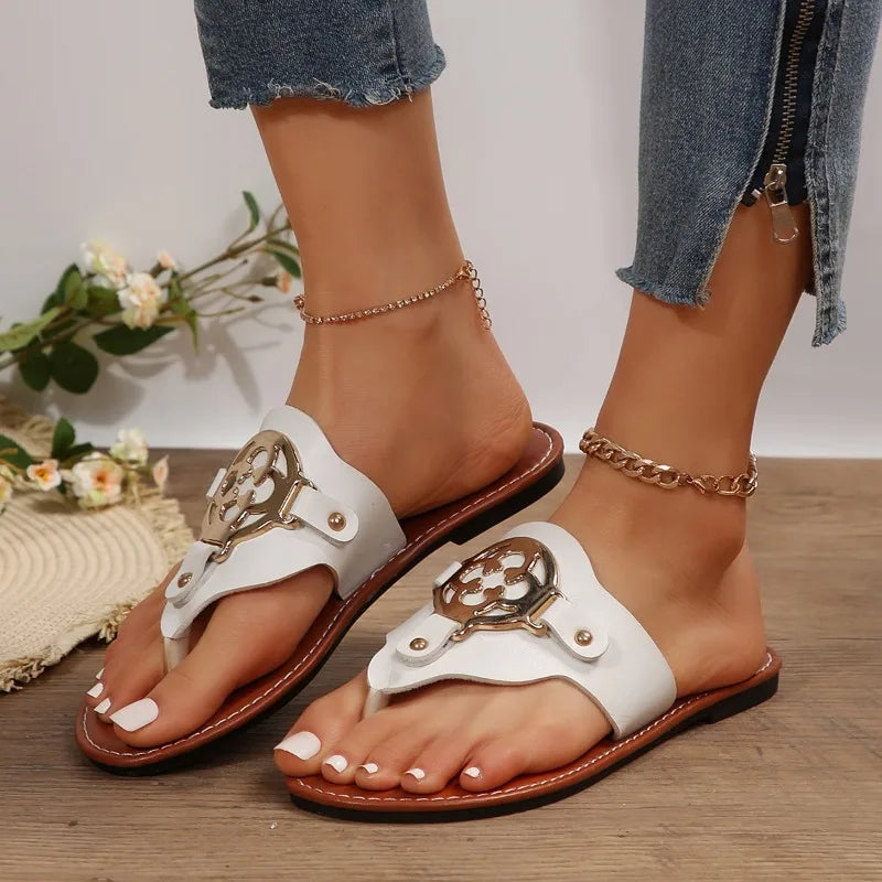 Women's open-toe flat sandals in neutral tone with breathable open silhouette for all-day summer comfort