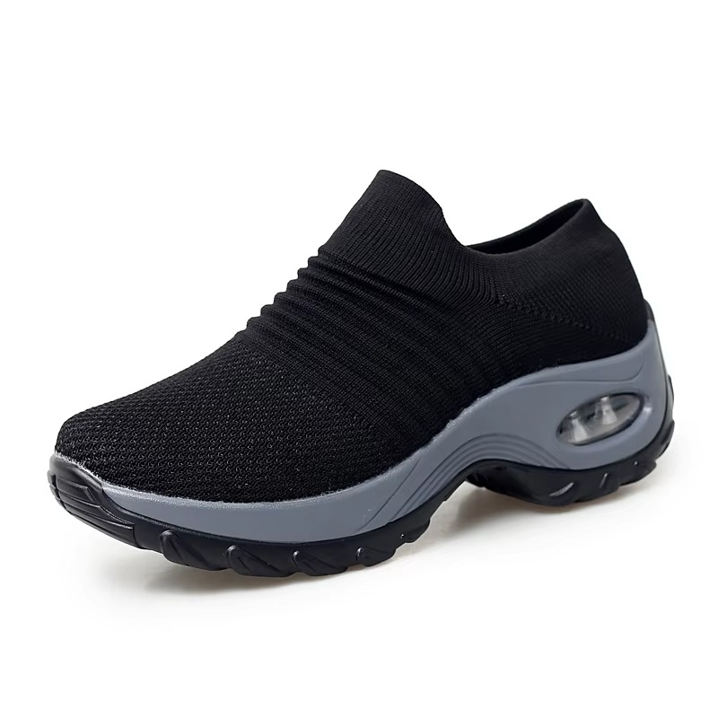 Women's black mesh platform sneakers with breathable knit upper and bold cushioned sole for gym