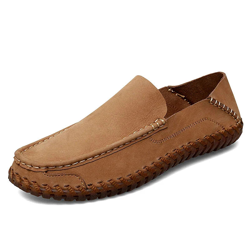 Men's brown leather moc toe loafers with braided trim detail, classic slip-on style
