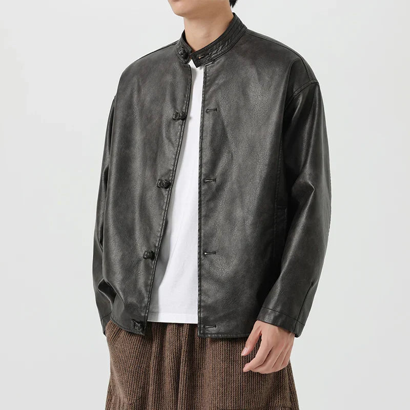 Men's vintage washed leather coat with mandarin collar, distressed patina, and toggle buttons
