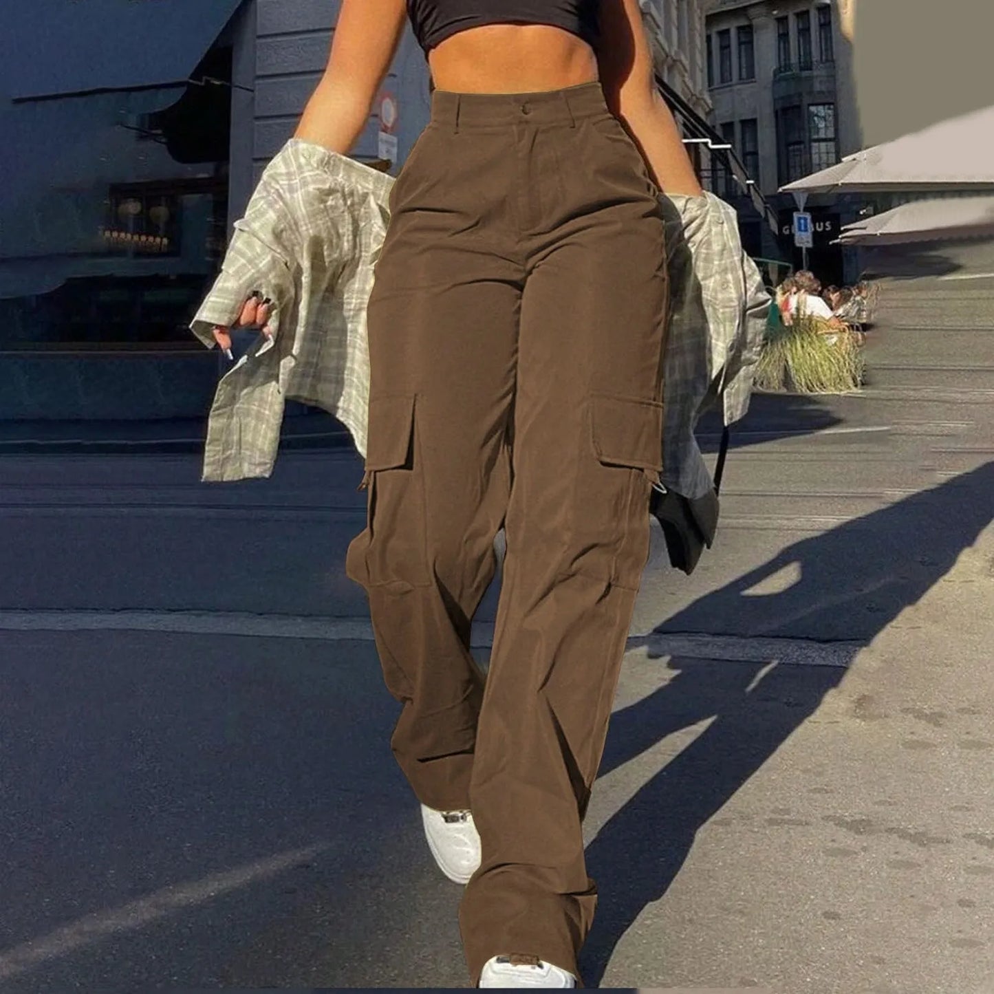 Women's high-waist cargo trousers with structured rise and practical pockets for modern streetwear