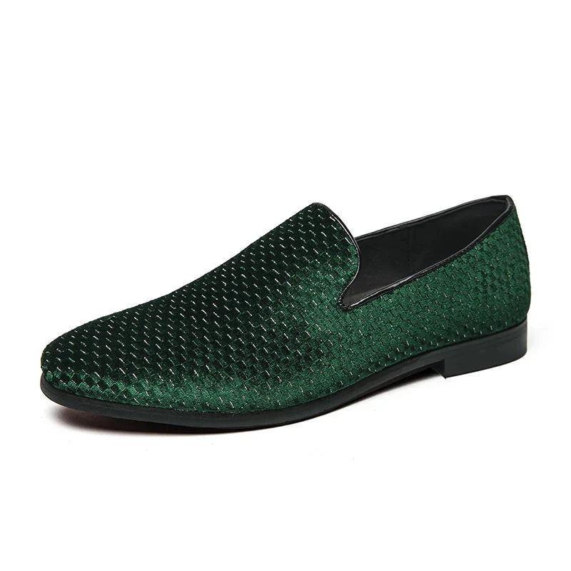 Men's slip-on loafers in classic tones featuring embossed geometric pattern, sleek silhouette for formal style