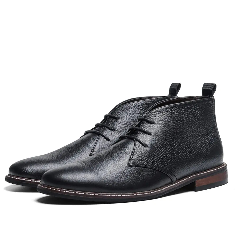 Brown leather everyday boots with reinforced stitching, timeless silhouette, and non-slip outsole