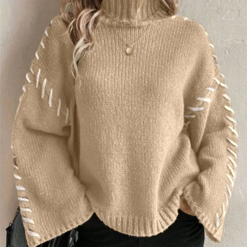 Carmine red knit pullover sweater high neck relaxed fit contrast sleeve detail winter essential