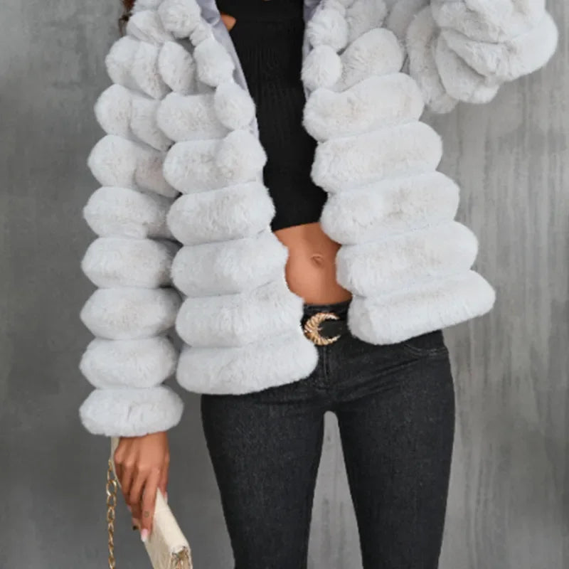 Women's short faux fur coat in plush polyester, chic winter outerwear with luxurious soft texture
