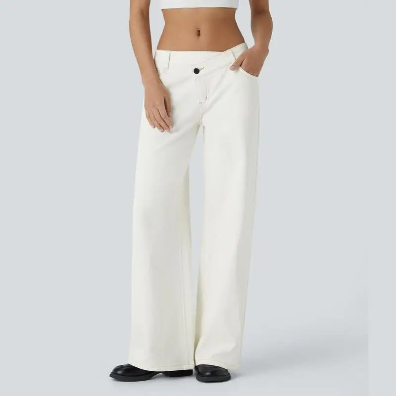 Women's baggy wide-leg low-rise jeans with asymmetric zipper pockets, relaxed denim silhouette