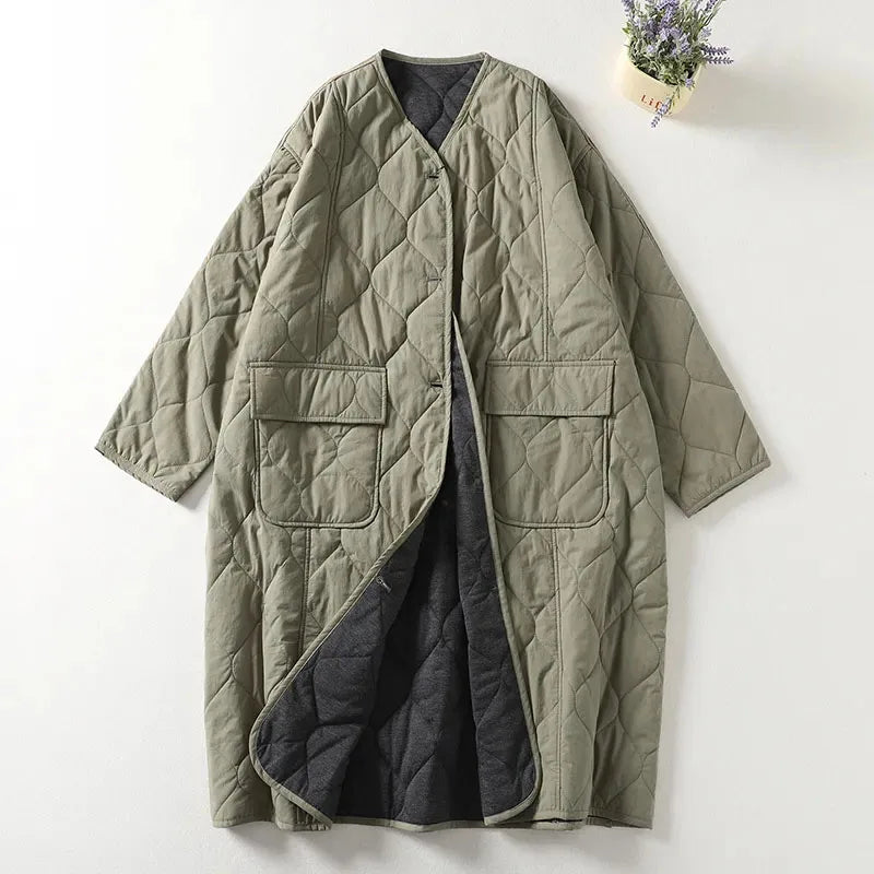 Women's oversized quilted longline coat with diamond stitching, foldable sleeves, and side pockets