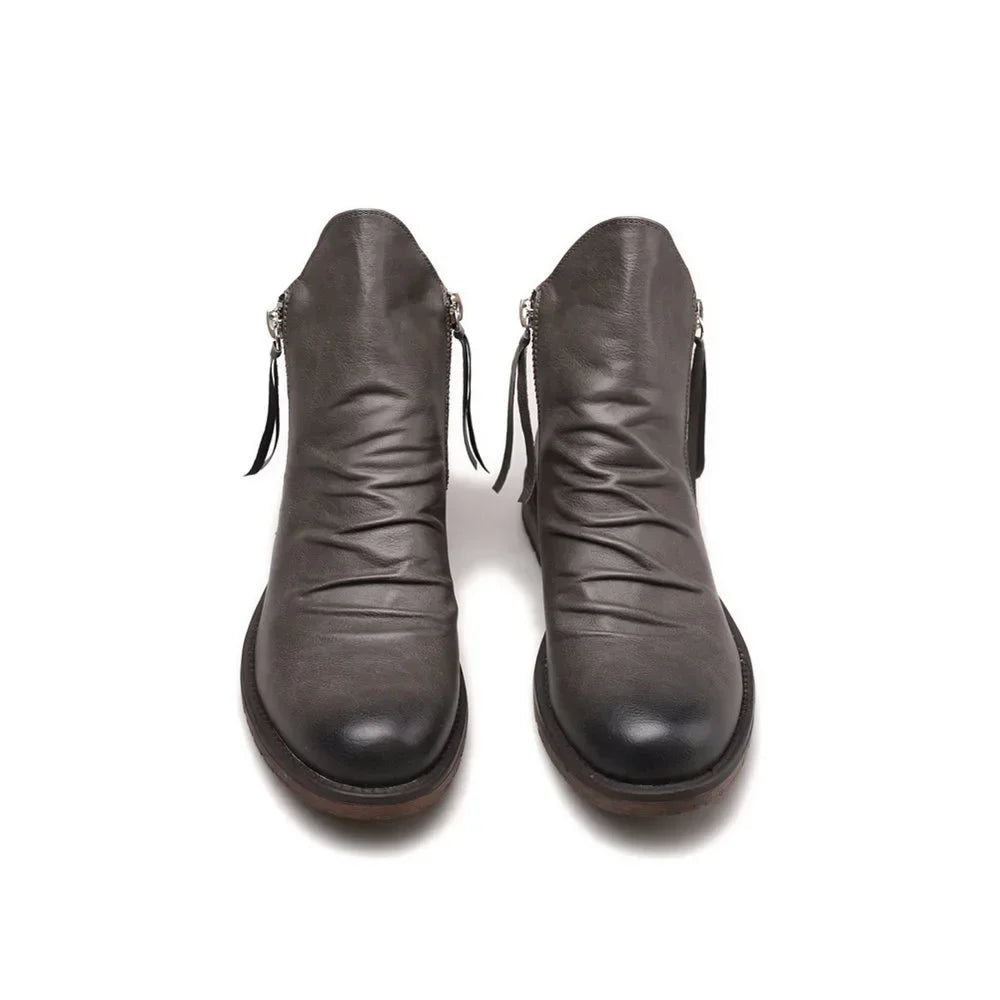 Handcrafted leather Chelsea boots with zipper closure, rich patina finish for all-day professional comfort