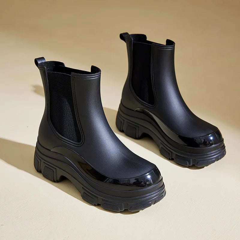 Women's chunky black Chelsea boots with warm insulated lining and bold platform sole