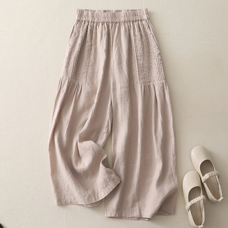 Women's beige linen wide-leg cropped pants with pintuck pleats and relaxed everyday silhouette