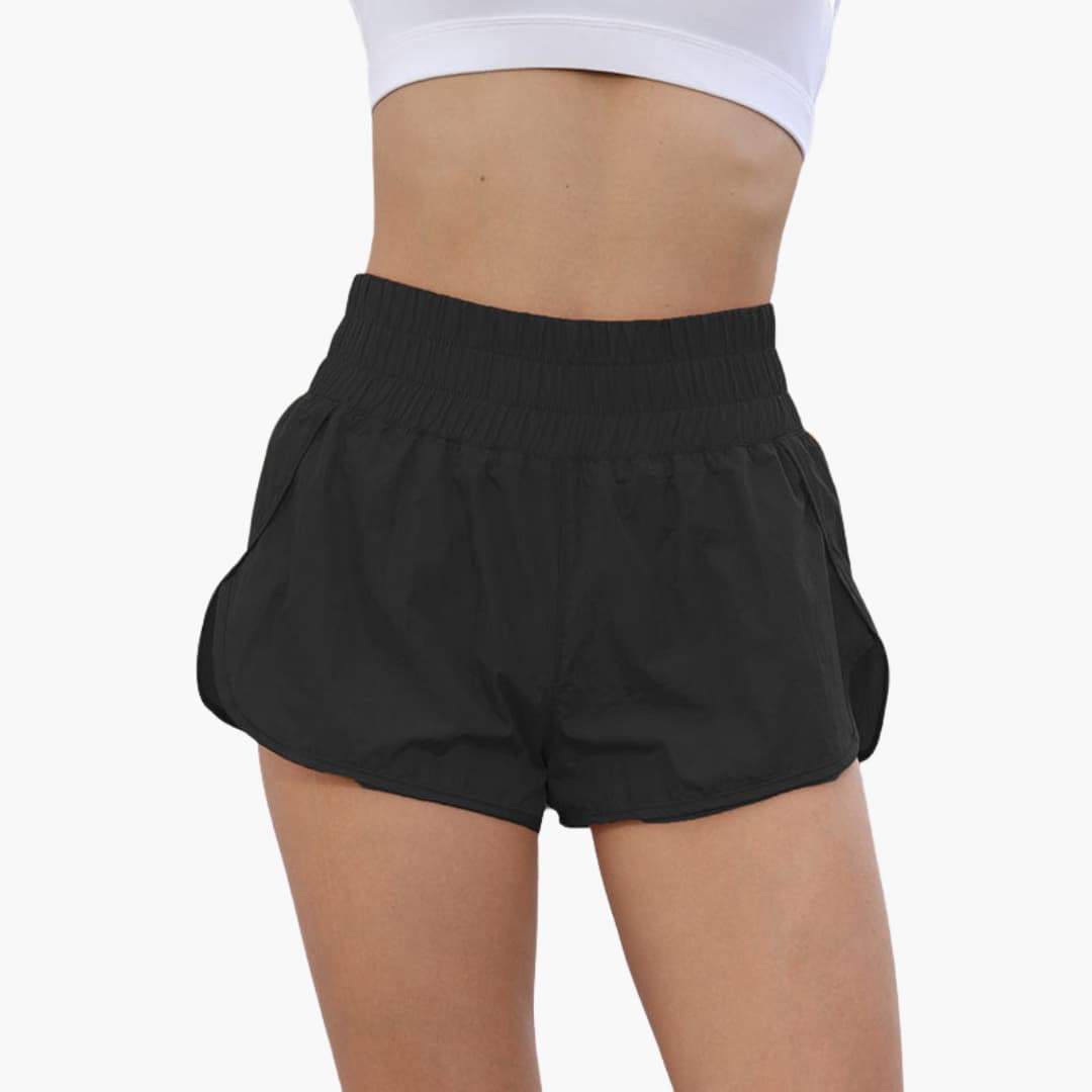 Women's running shorts with elastic waistband, side hip pockets, breathable fit for training