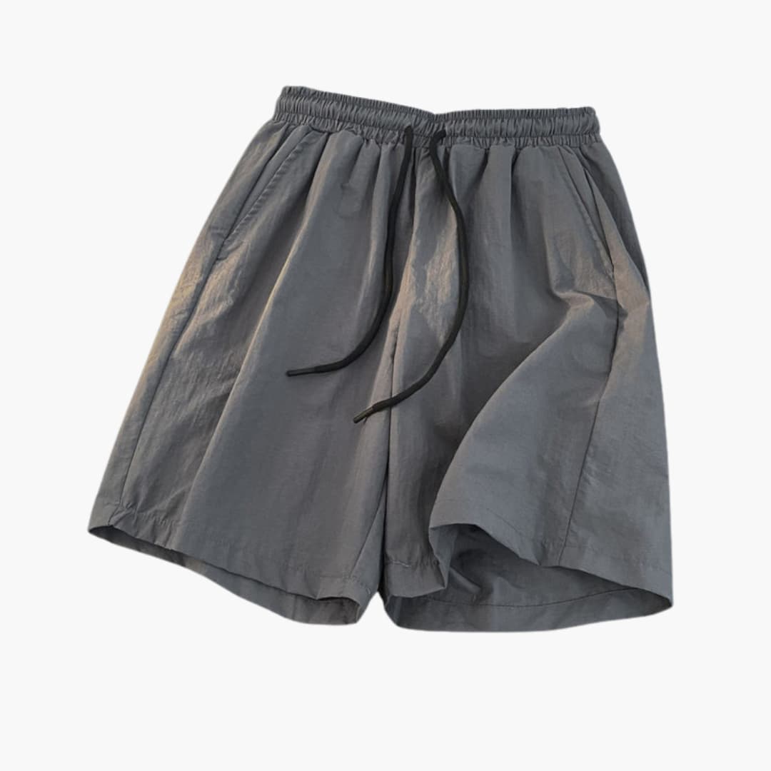 Women's athletic shorts with elastic drawstring waistband, hip pockets, lightweight active fit
