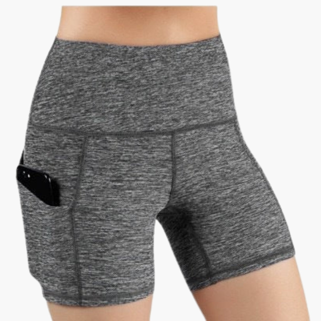 High waisted women's sports shorts with side pockets, breathable comfort fit for active wear