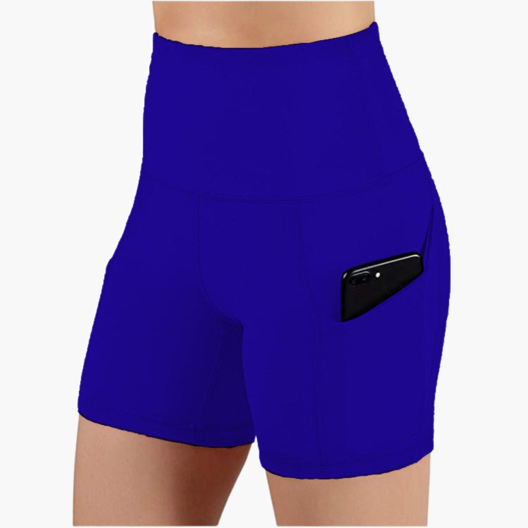 High waisted women's sports shorts with side pockets, breathable active wear for workouts