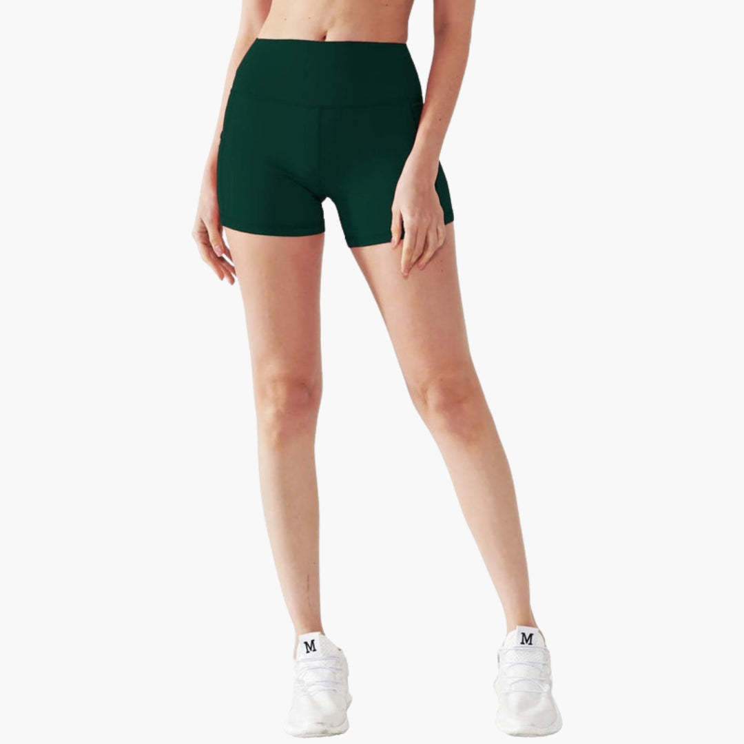 High waisted women's sports shorts with side pockets, breathable active wear for workouts