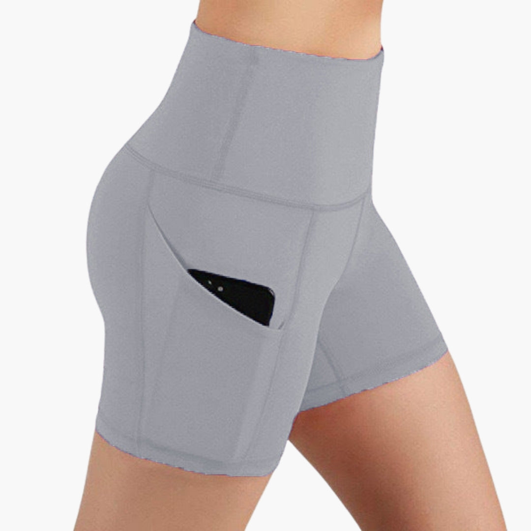 High waist women's sports shorts with side pockets, breathable active wear for workouts