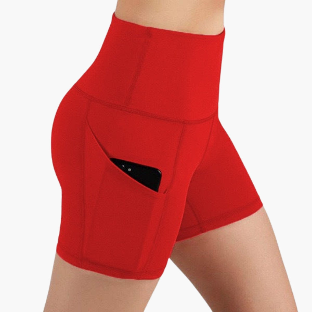 High waisted women's sports shorts with side pockets, breathable active wear for workouts