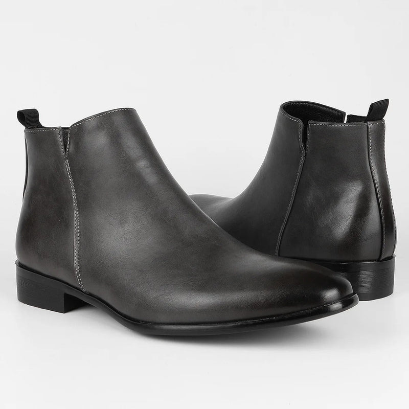 Men's black sleek ankle boots with side-zip closure, tapered silhouette, and low heel for modern wear