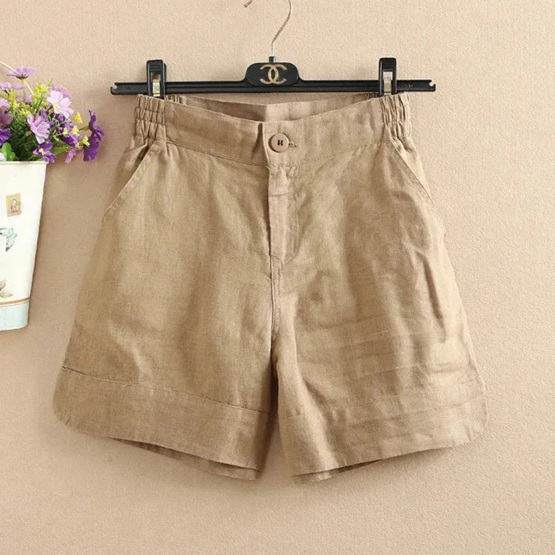 Women's beige linen relaxed-fit shorts with elastic waistband, breathable summer essential