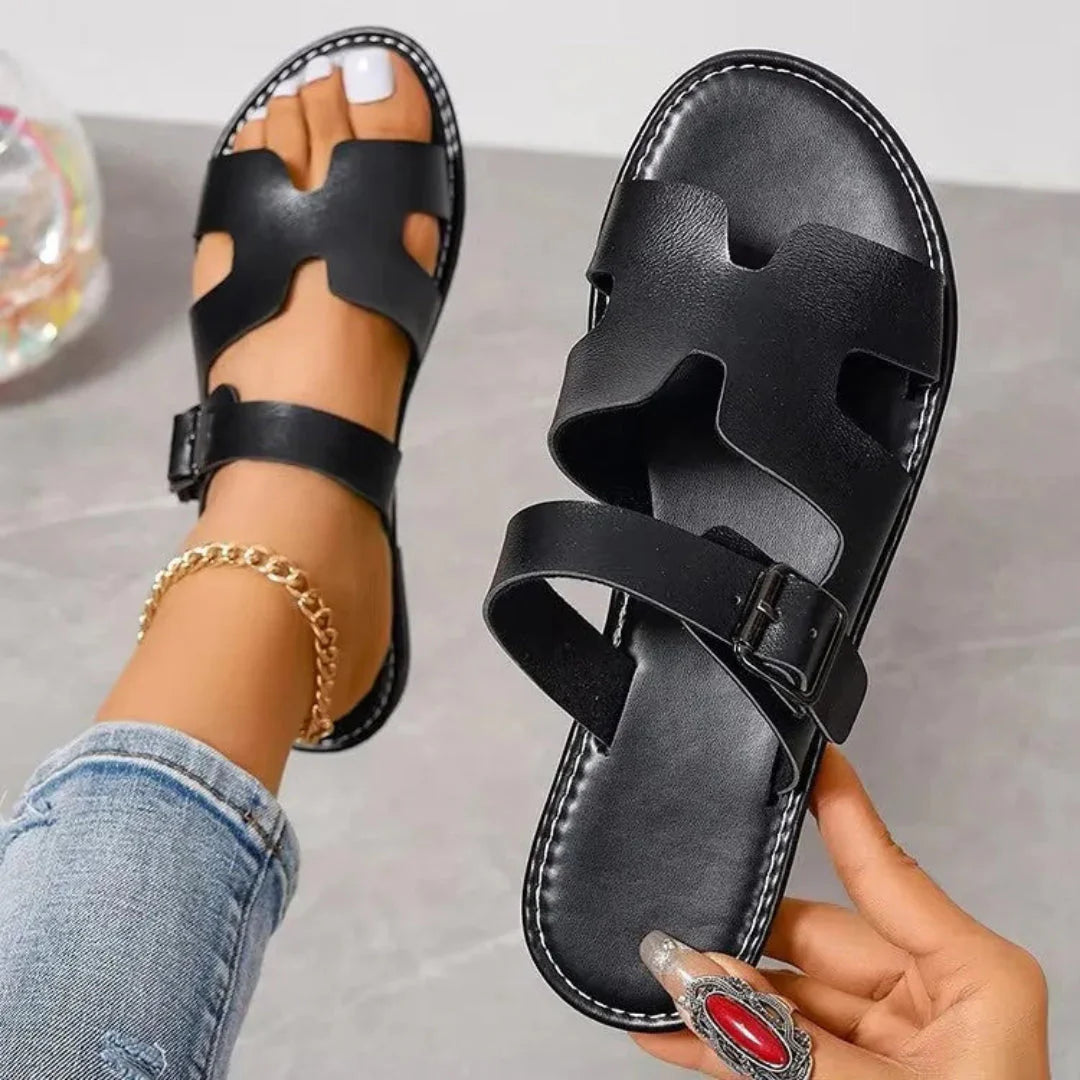 Women's brown faux leather buckle sandals with cut-out minimalist design and toe coverage