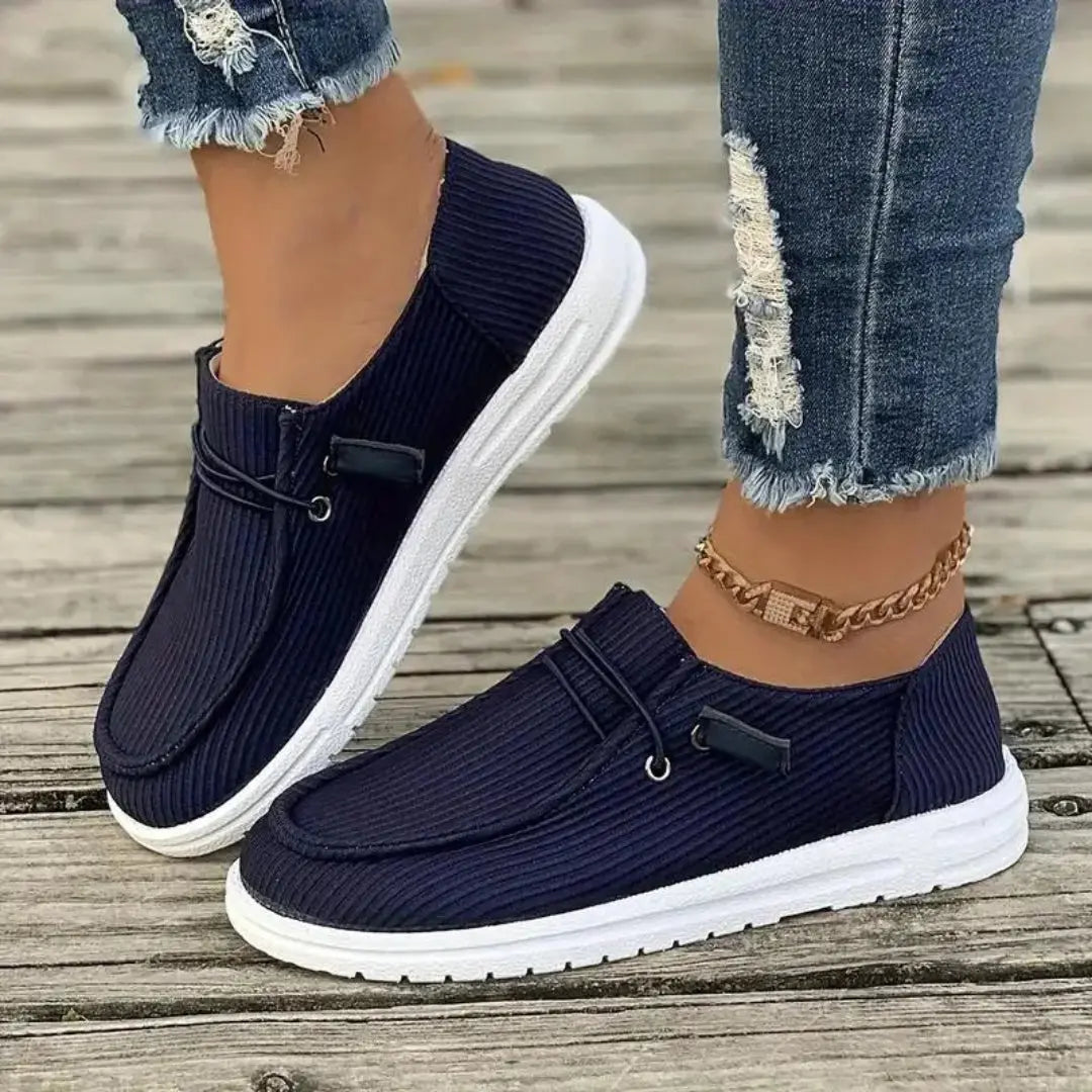 Women's slip-on casual shoes with ribbed textile upper, lightweight breathable design for all-day comfort