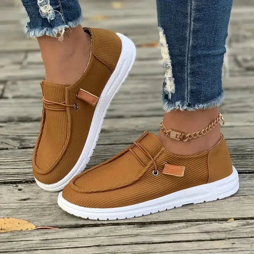 Women's slip-on casual shoes with ribbed textile upper, lightweight breathable design for all-day comfort