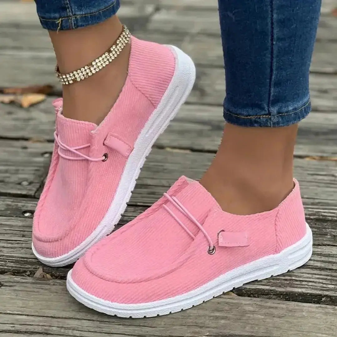 Women's beige ribbed slip-on sneakers with breathable textile upper and flexible lightweight sole