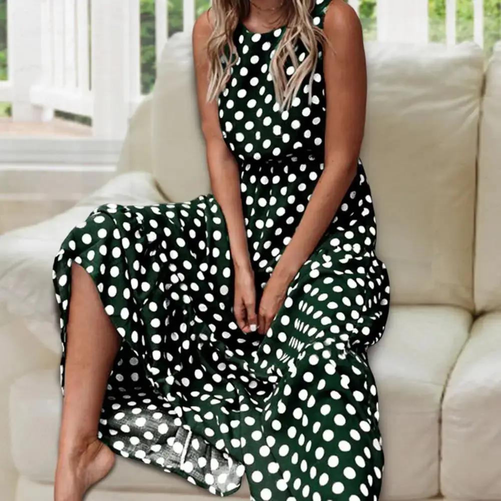 Women's sleeveless polka dot maxi dress, relaxed flowing silhouette with vintage-inspired allover print