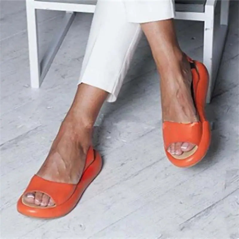 Women's beige peep-toe slingback flats with secure ankle strap for breathable all-day comfort