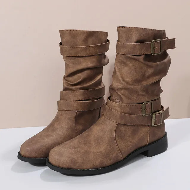 Women's black slouch mid-calf boots with buckle strap detail and relaxed silhouette for casual wear