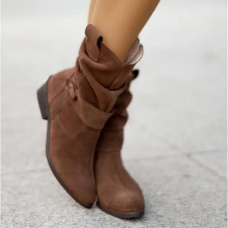 Women's faux suede slouched ankle boots with low heel and buckle strap, relaxed chic silhouette